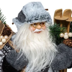 Figurka materiałowa Święty Mikołaj z nartami 45 cm