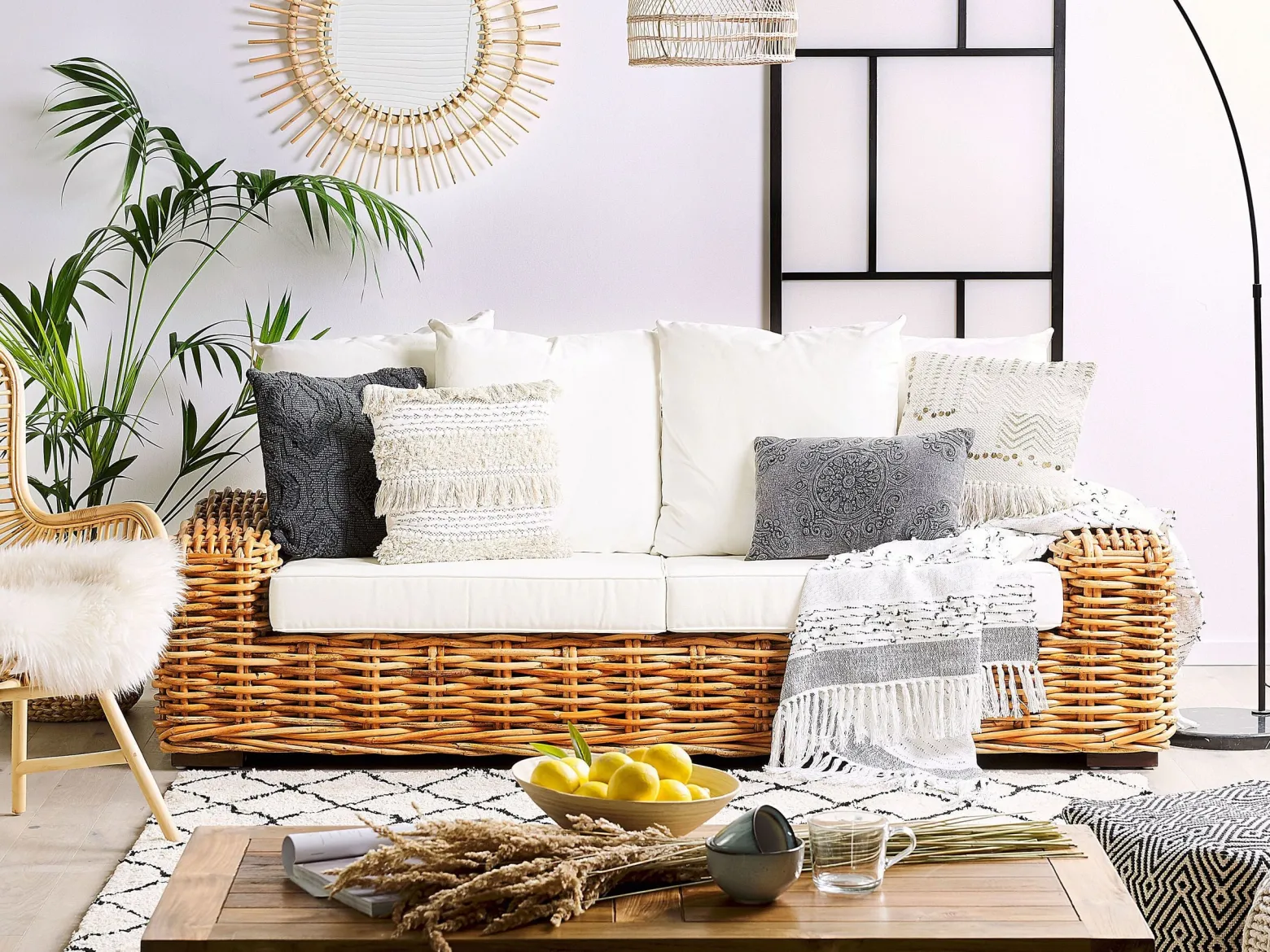 Ogrodowa sofa rattanowa z poduszkami